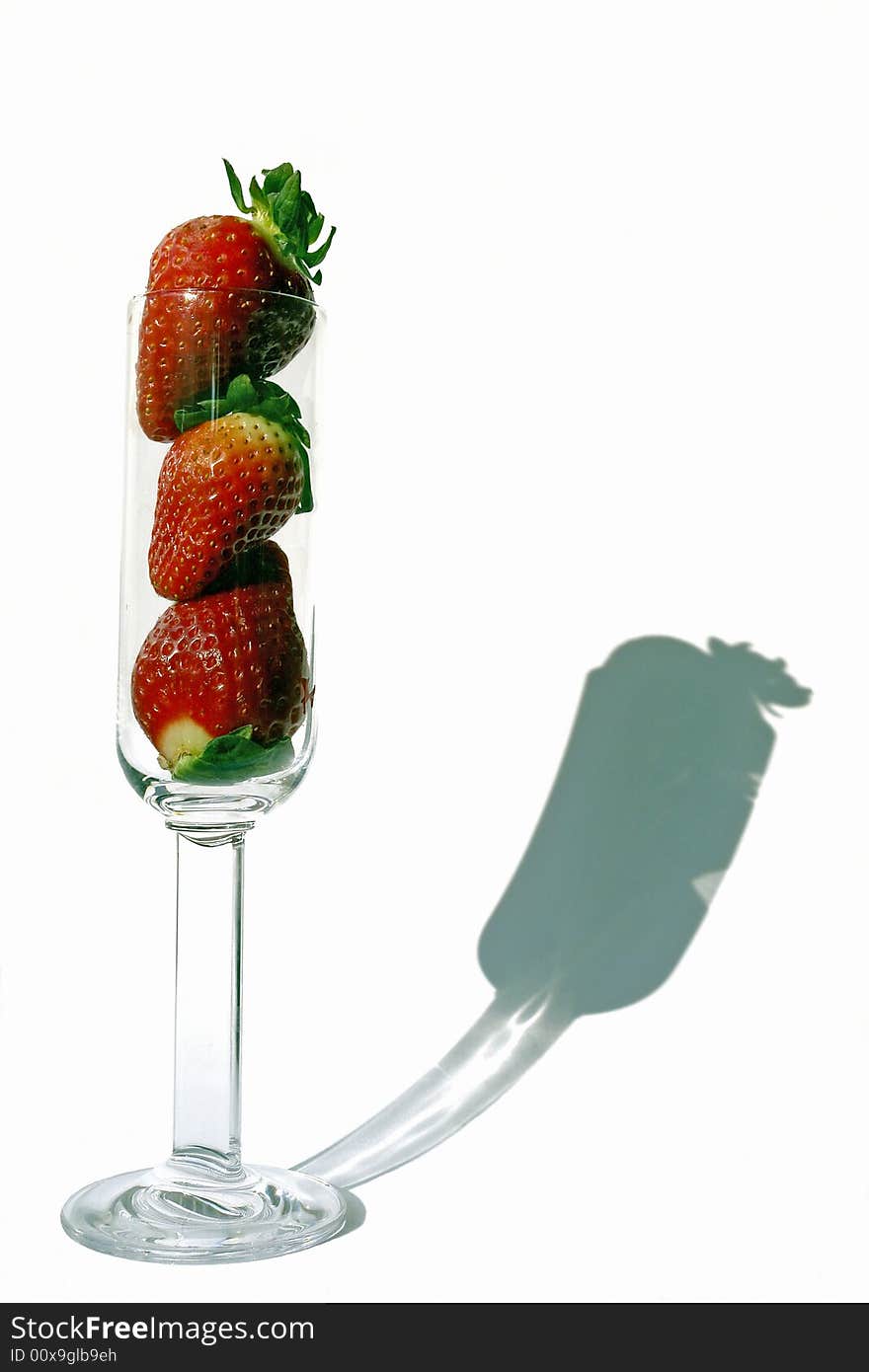 Strawberries inside of a flute glass