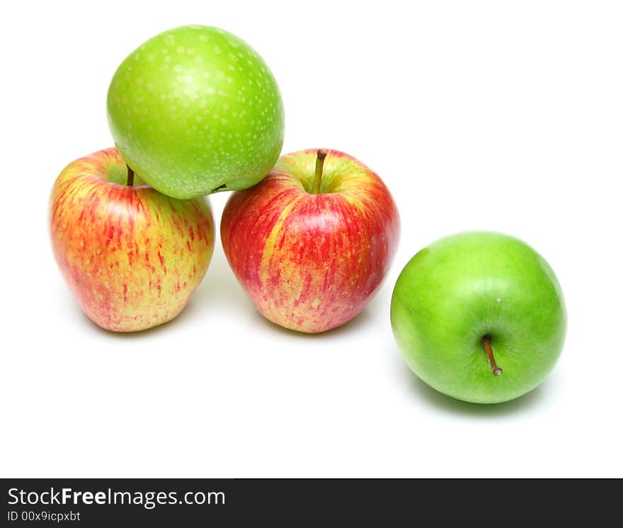 The ripe juicy apples on white. Isolation, shallow DOF. The ripe juicy apples on white. Isolation, shallow DOF.