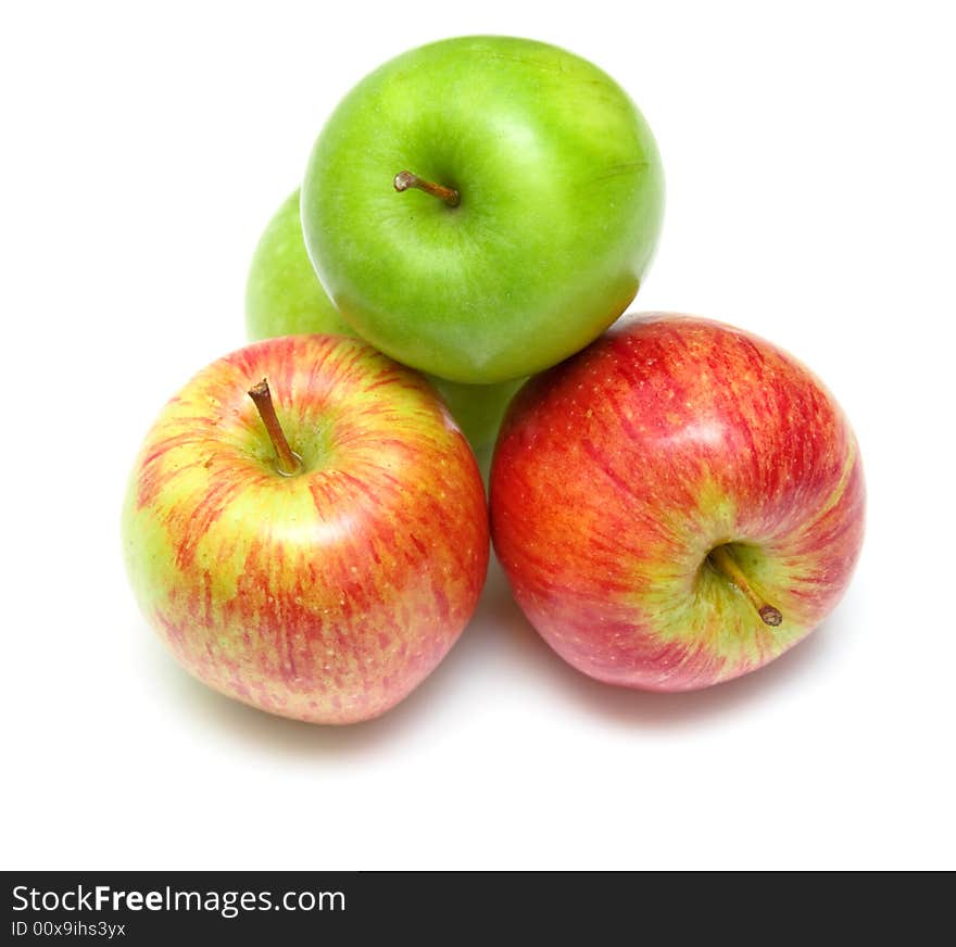 The ripe juicy apples on white. Isolation, shallow DOF.