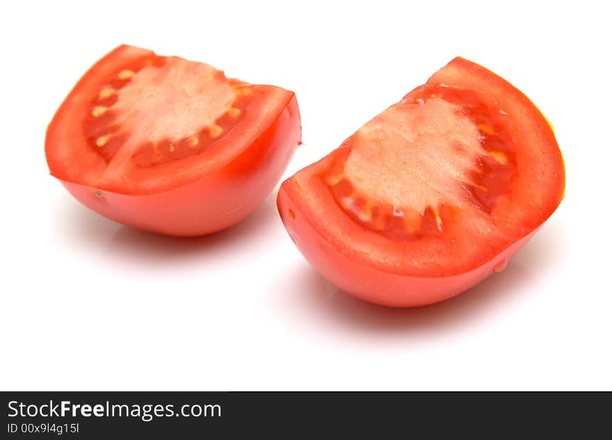 Perfect the tomatoes. Isolation on white. Shallow DOF.