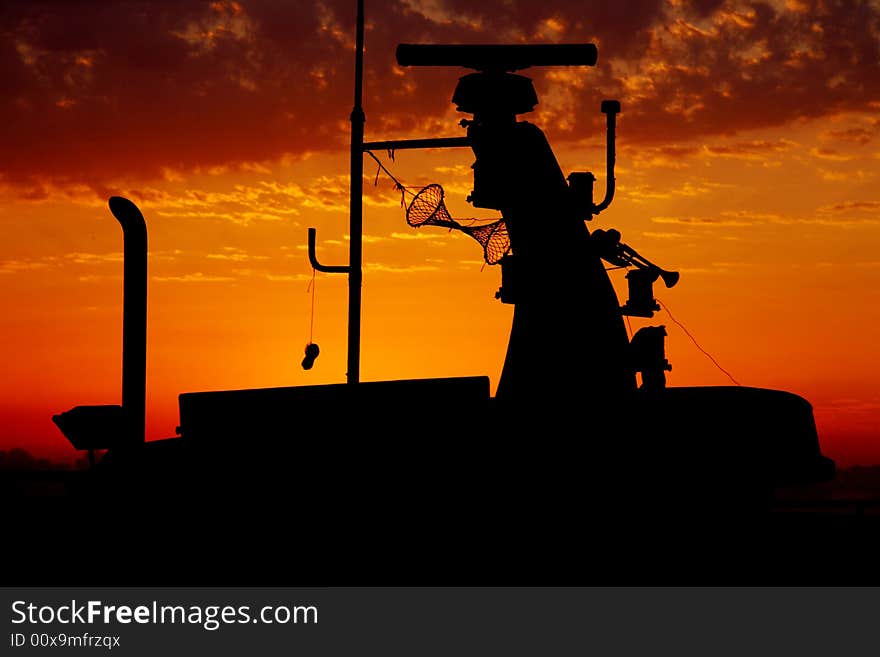 Beautiful sunset and fishing boat