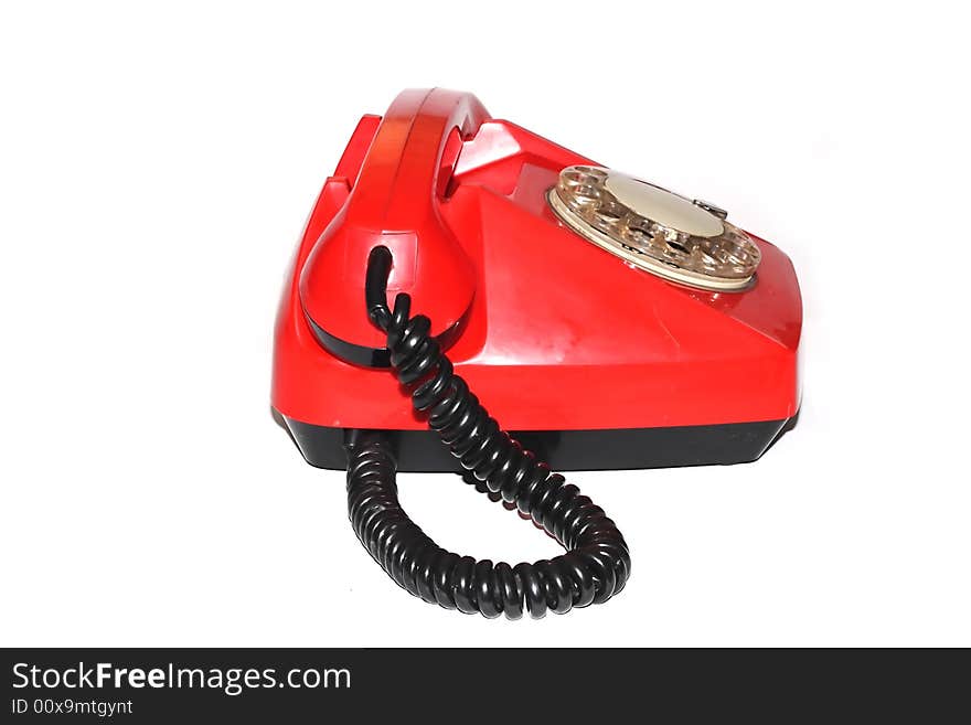 Red telephone on white background isolated