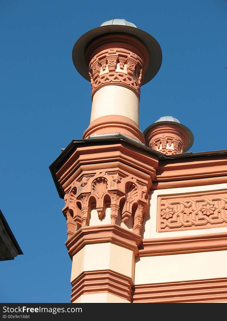 A fragment of the Big Chorale Synagogue.Turret on the blue sky background. Saint-Petersbourg. A fragment of the Big Chorale Synagogue.Turret on the blue sky background. Saint-Petersbourg.