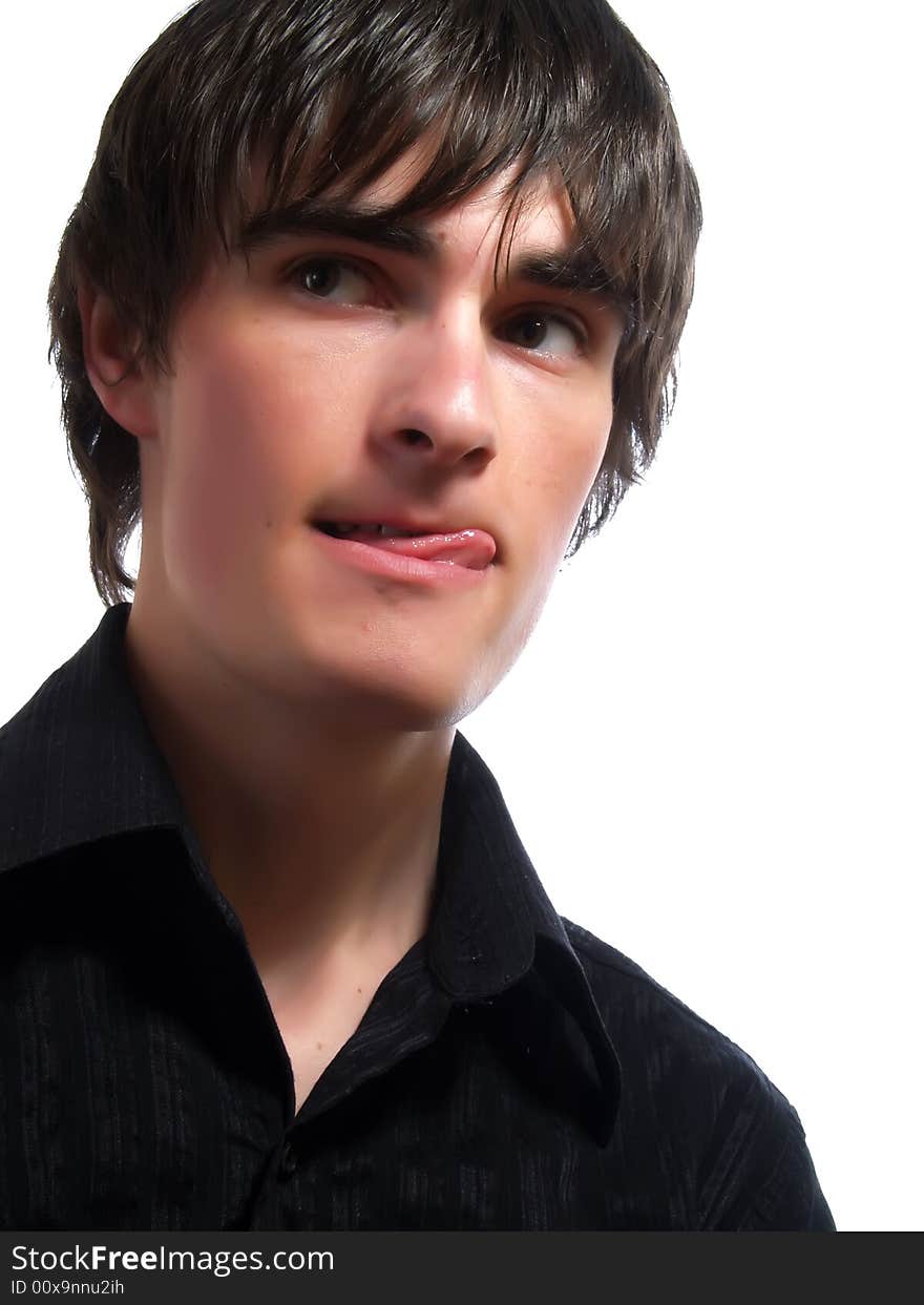 A portrait about a trendy handsome young guy who is looking up and he is thinking. He is wearing a stylish black shirt. A portrait about a trendy handsome young guy who is looking up and he is thinking. He is wearing a stylish black shirt.