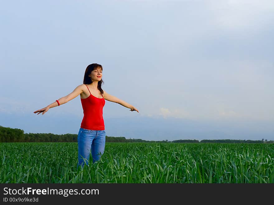 Young woman in a wheat field