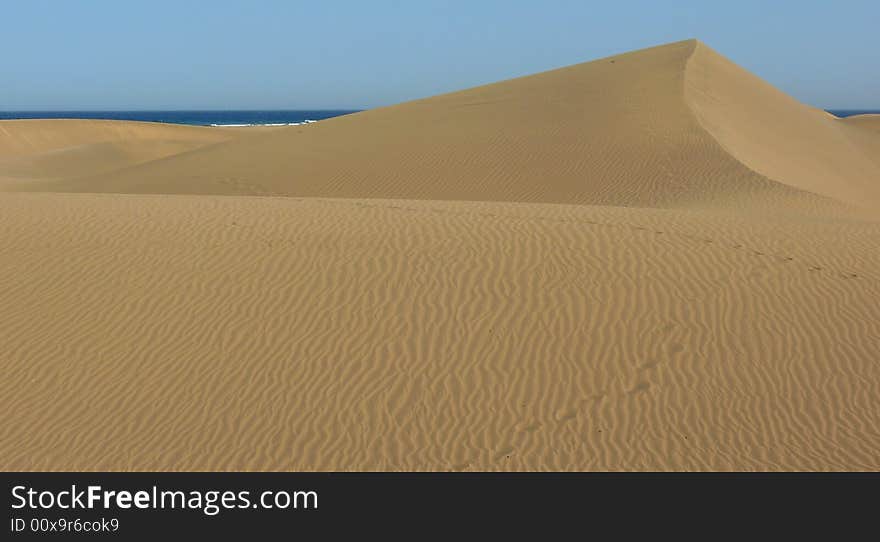 Sand dunes in the desert.At the Gran Canary's island. Sand dunes in the desert.At the Gran Canary's island