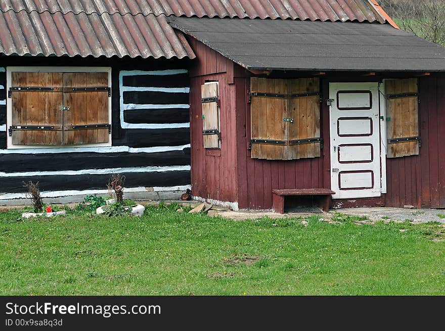 Old house ,closed woody door, windows with padlocks. Old house ,closed woody door, windows with padlocks