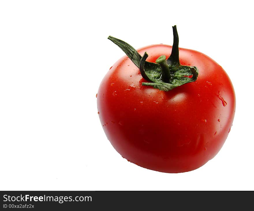 Red tomato in the white background