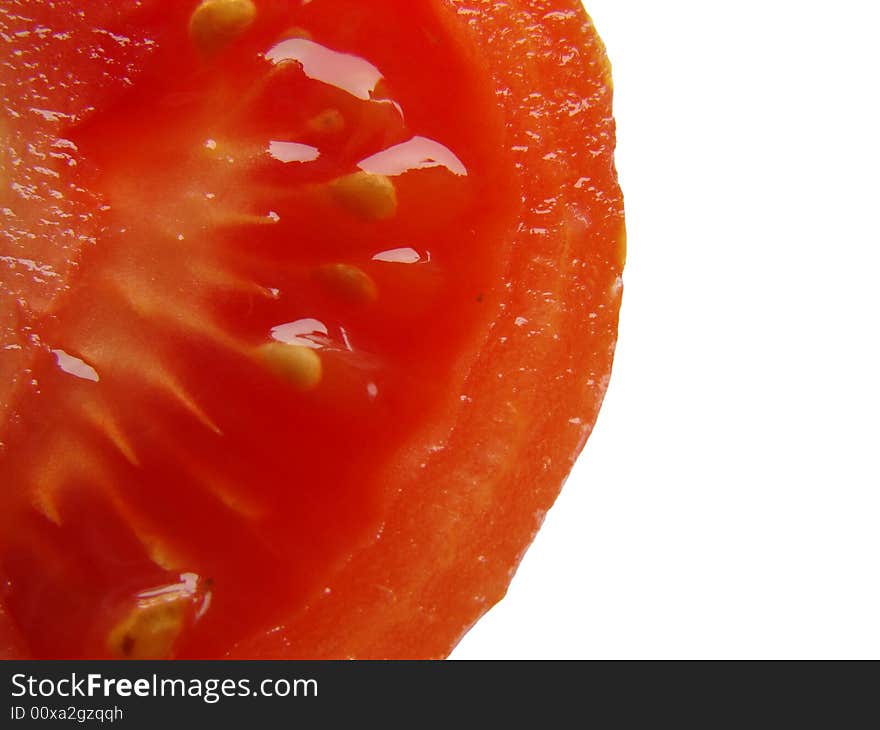 Half of tomato's lobule in the white background. Half of tomato's lobule in the white background