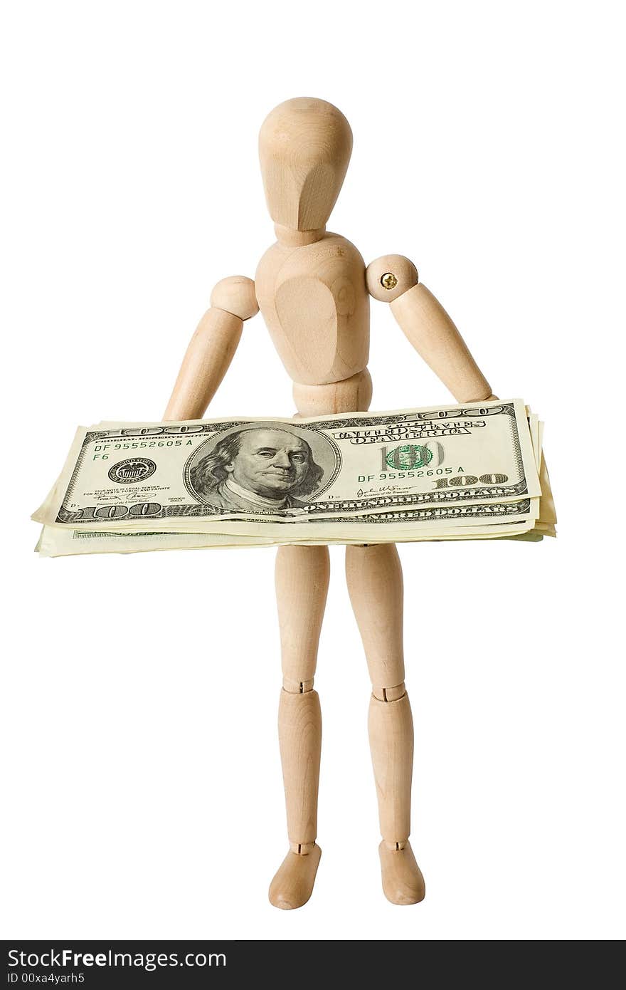 The wooden figure holds dollars.Isolated on white [with clipping path]. The wooden figure holds dollars.Isolated on white [with clipping path].