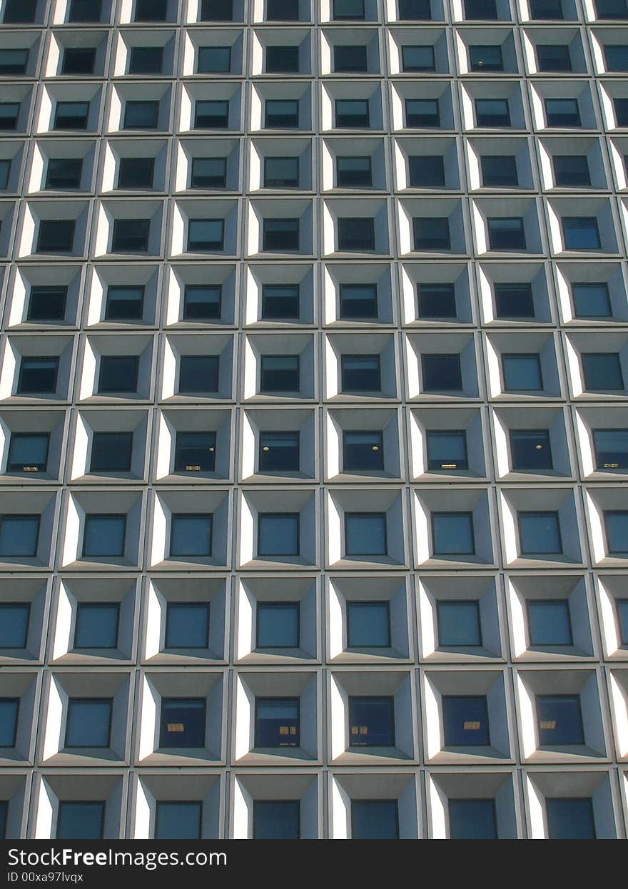 Exterior of a modern office tower. Exterior of a modern office tower.