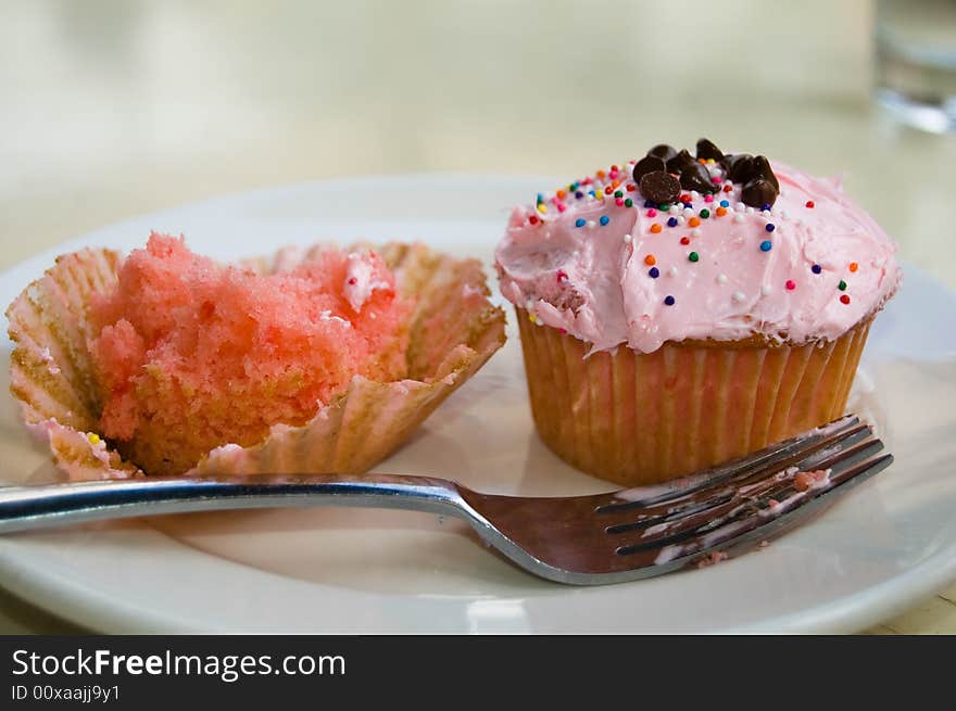 Pink Cup Cakes with Chocolate Chips on the Frosting. Pink Cup Cakes with Chocolate Chips on the Frosting