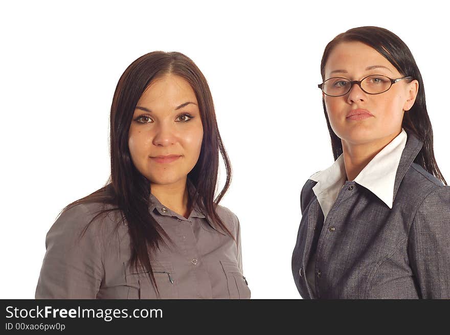 Two attractive businesswomen on white background. Two attractive businesswomen on white background