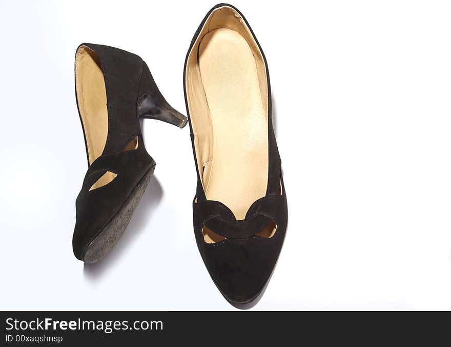 Black feminine loafers on white background. Black feminine loafers on white background