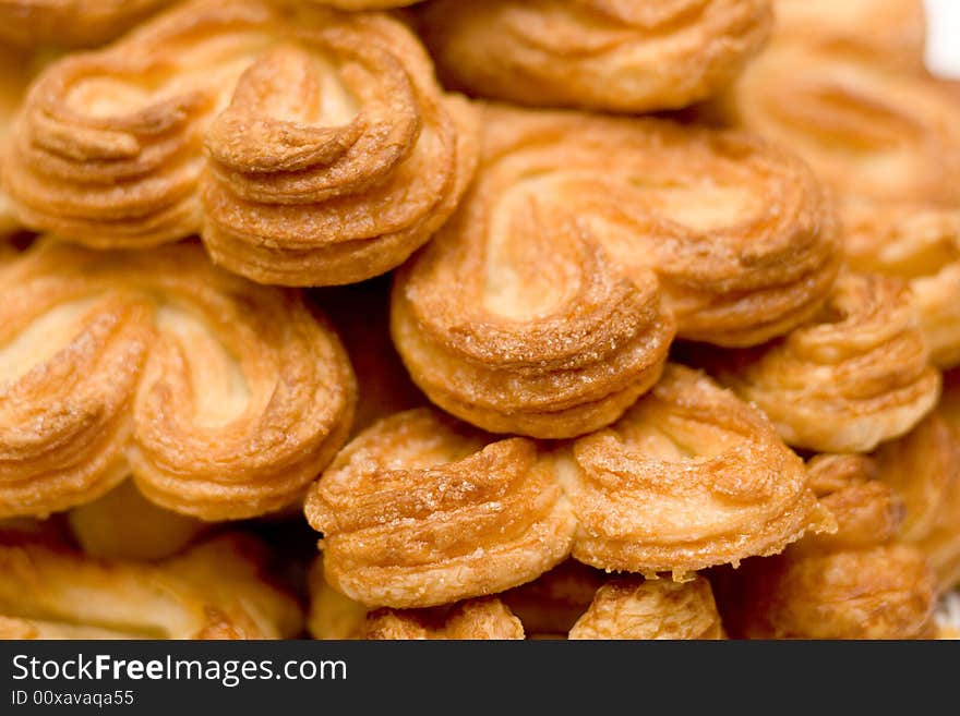 Close-up of fresh baked heart-shaped sugar buns