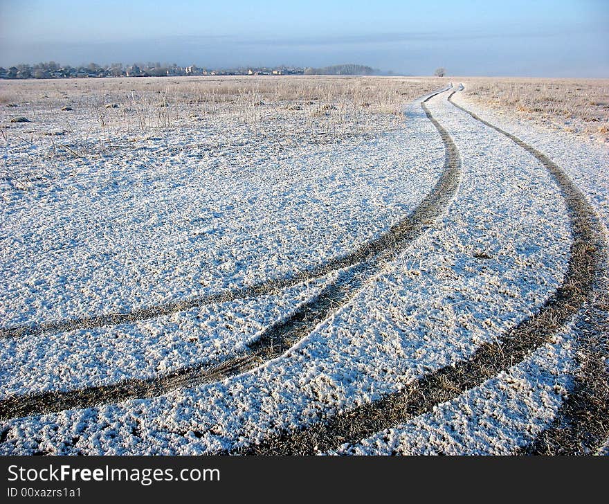 Machine trace on snow-clad field. Machine trace on snow-clad field