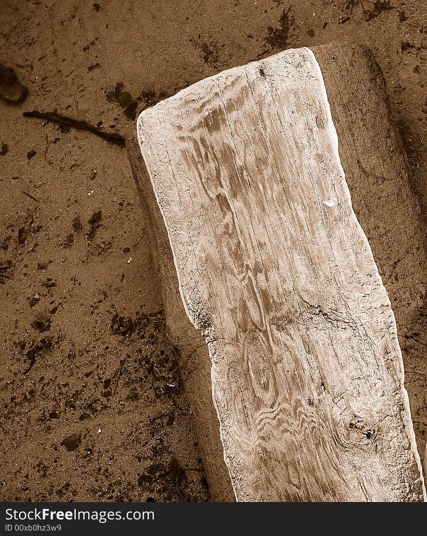 Large Log Partially Underwater in Riverbed. Large Log Partially Underwater in Riverbed