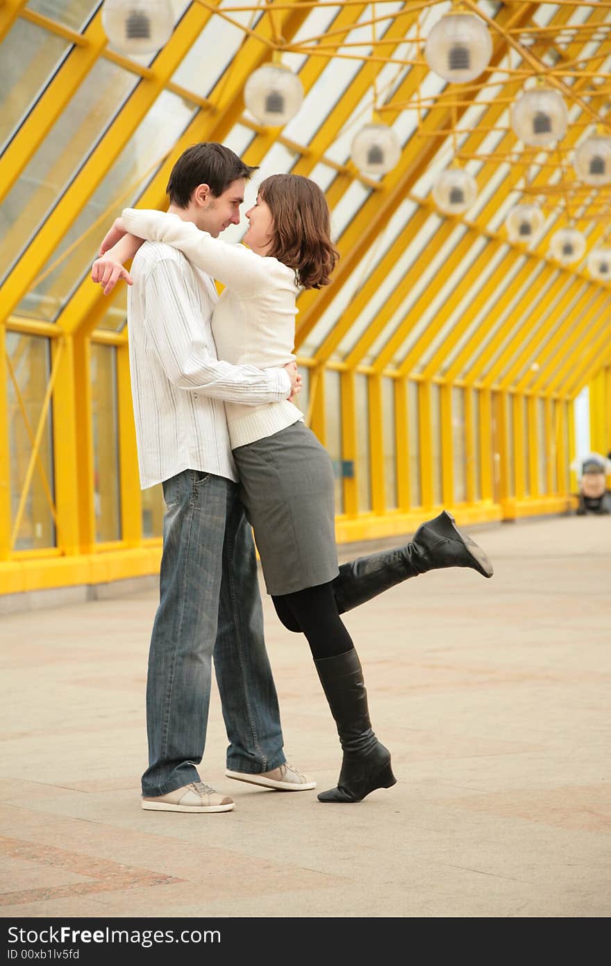 Young couple on a footbridge