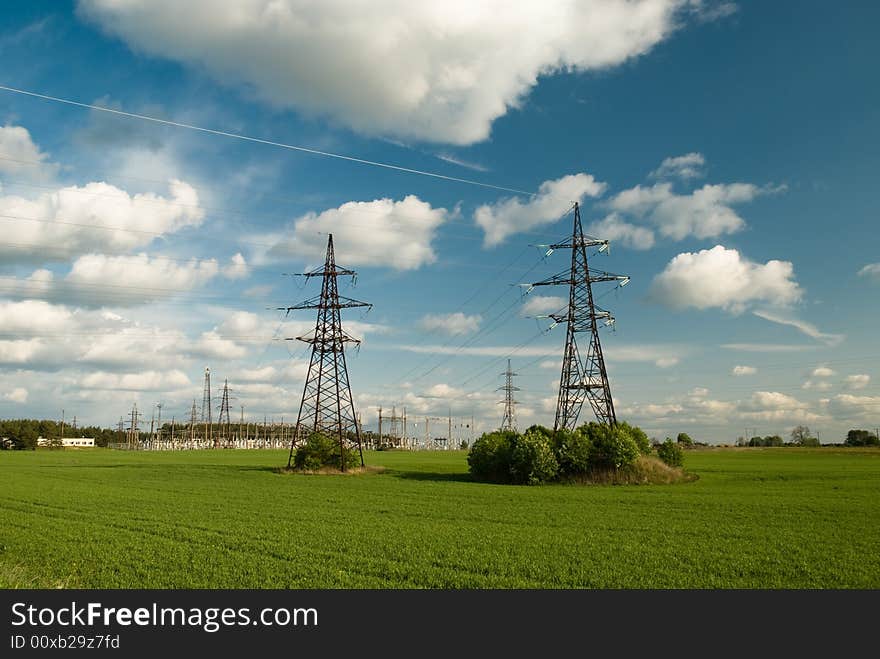 Powerlines under clowdy sky