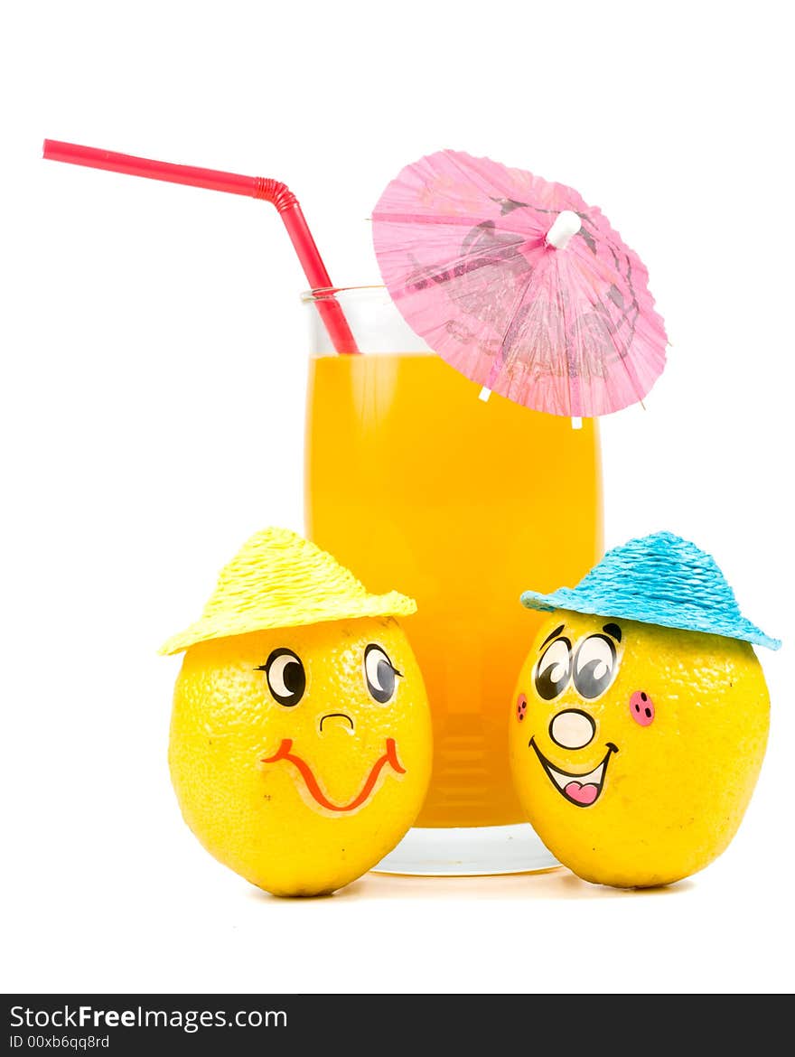 Cheerful little men from a fresh lemon and a juice glass isolated on a white background