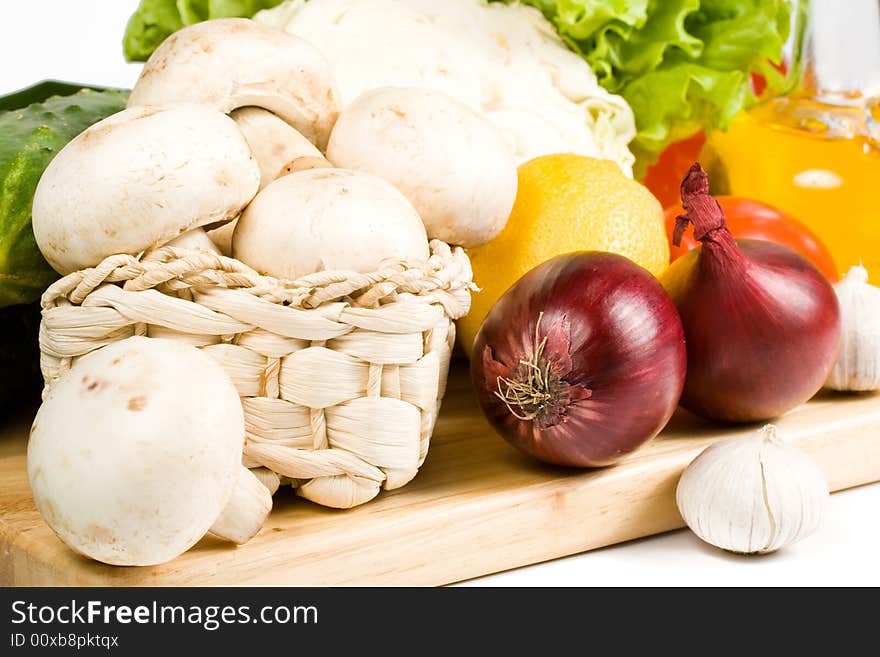 Fresh vegetables isolated on a white background.