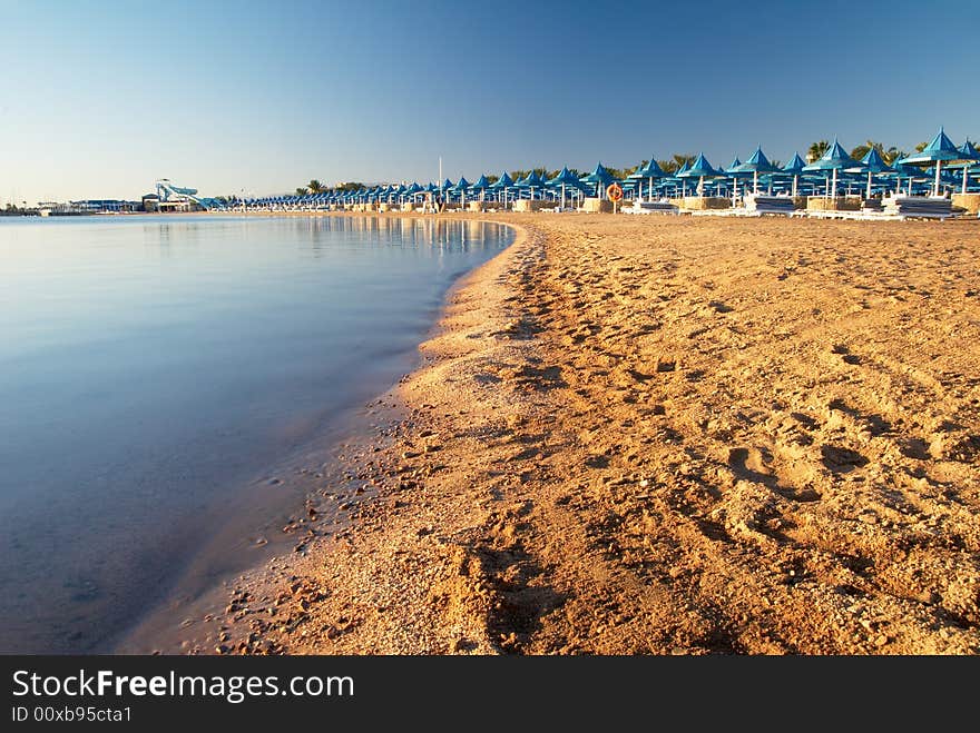 Beach And Parasols