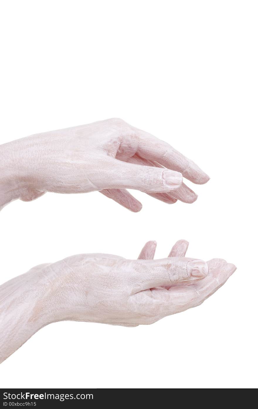 Hydrating cream on the hands, isolated on white