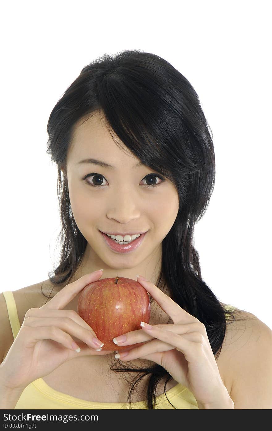 Pretty smiling woman with apple