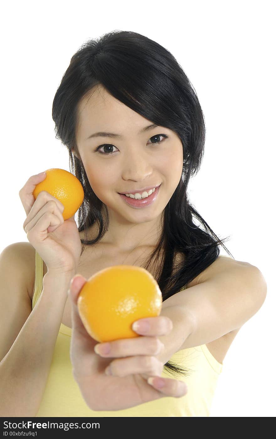 Pretty smiling woman with orange