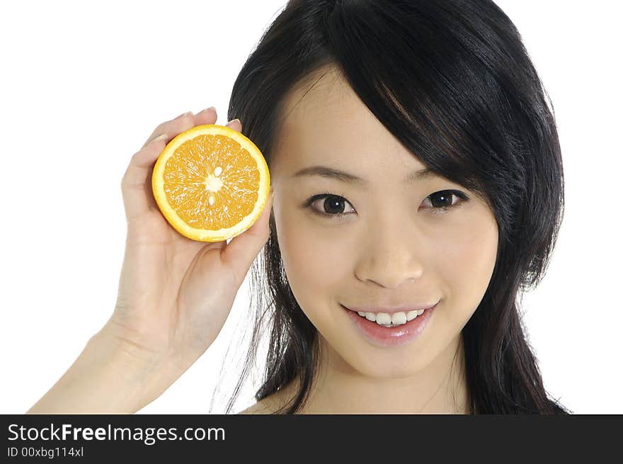 Pretty smiling woman with orange