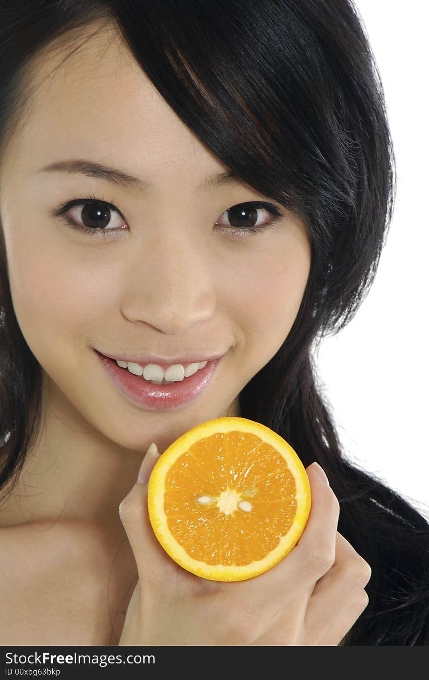 Pretty smiling woman with orange