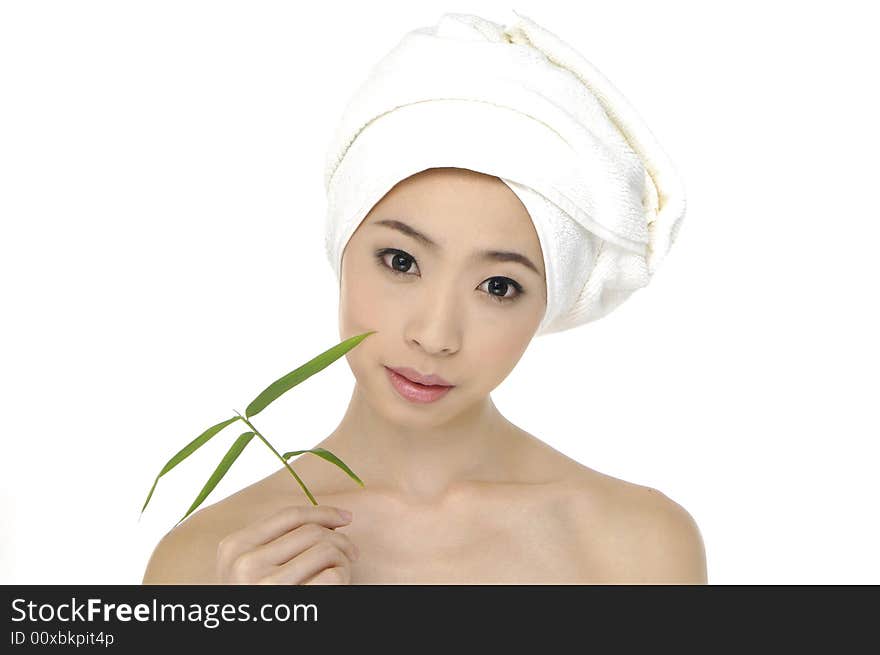 Portrait of Fresh and Beautiful woman wearing white towel on her head. Portrait of Fresh and Beautiful woman wearing white towel on her head