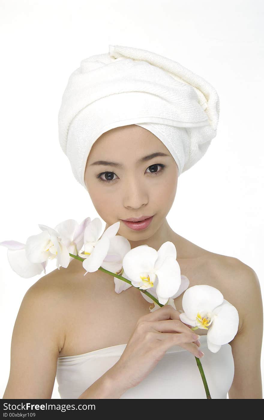 Portrait of Fresh and Beautiful woman wearing white towel on her head