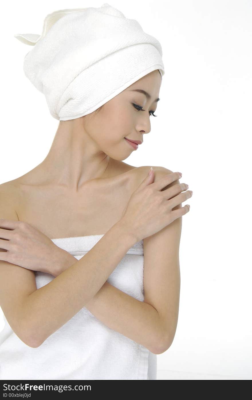 Portrait of Fresh and Beautiful woman wearing white towel on her head