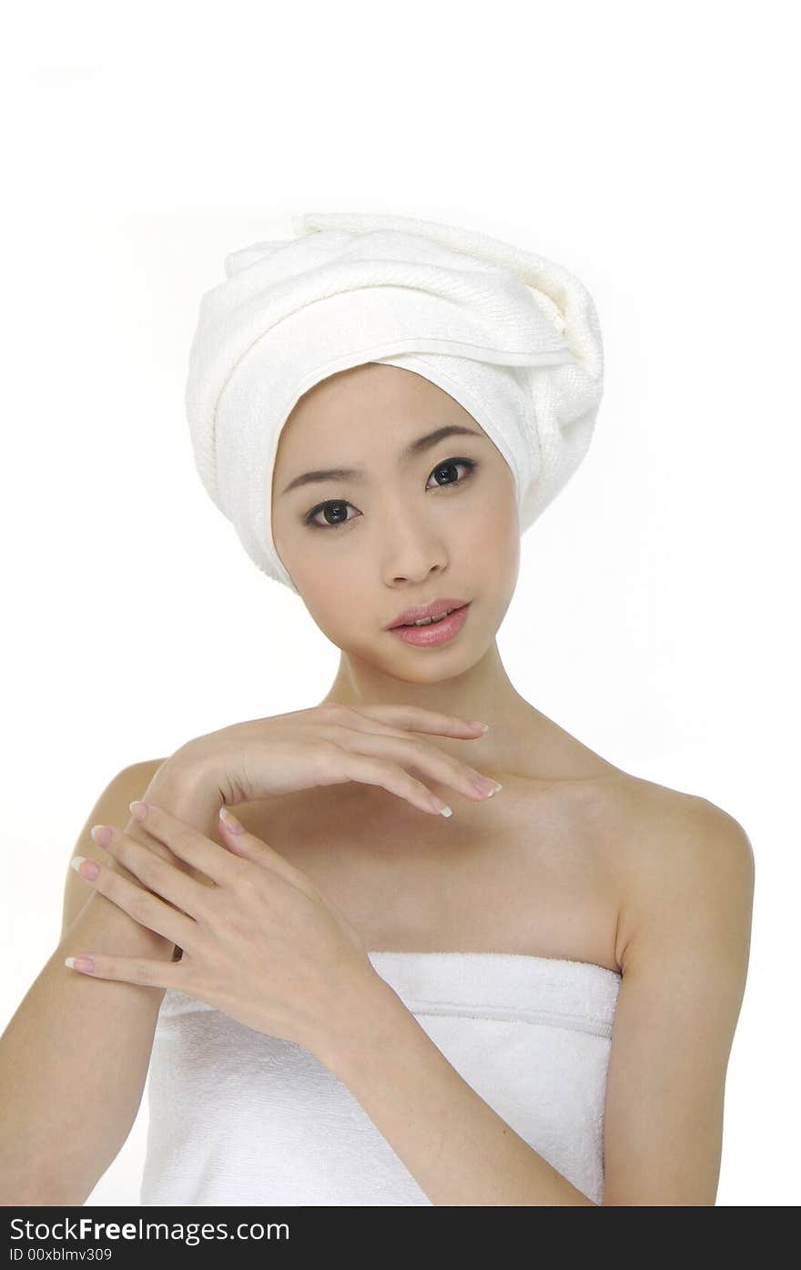 Portrait of Fresh and Beautiful woman wearing white towel on her head