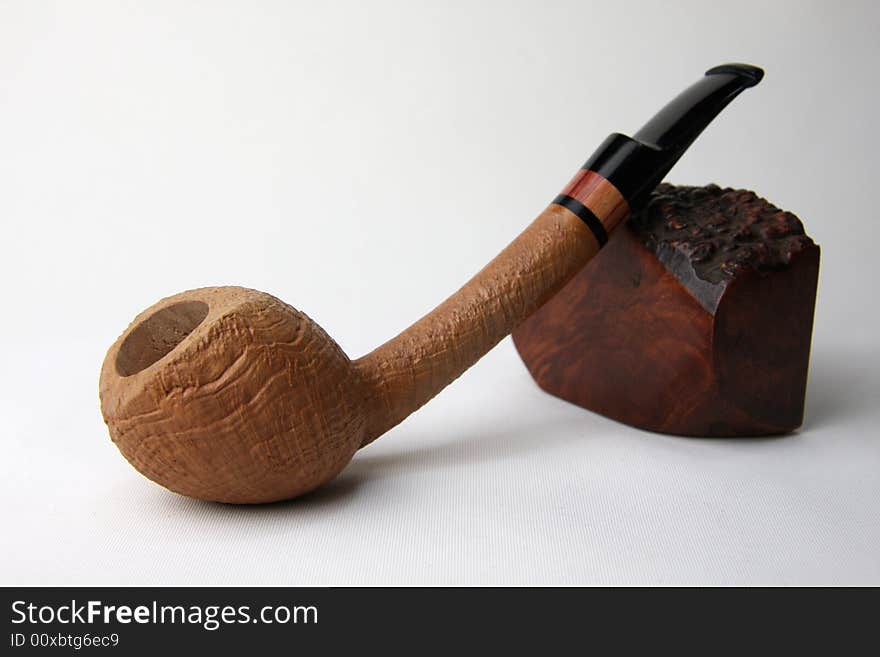 An tobacco pipe on white background.