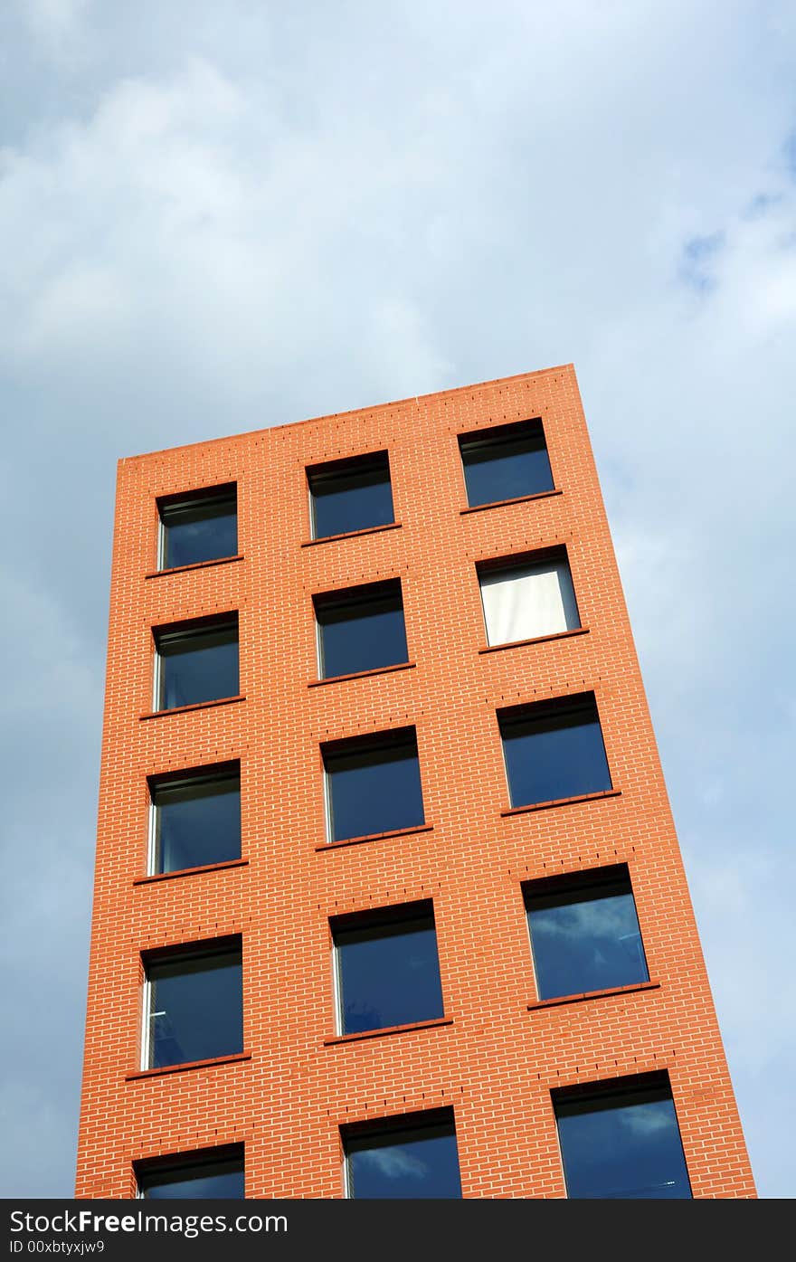 Orange building against sky