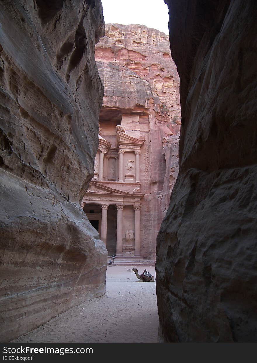 View on the Treasury from Sikh in Archaeological site of Petra in Jordan. View on the Treasury from Sikh in Archaeological site of Petra in Jordan.
