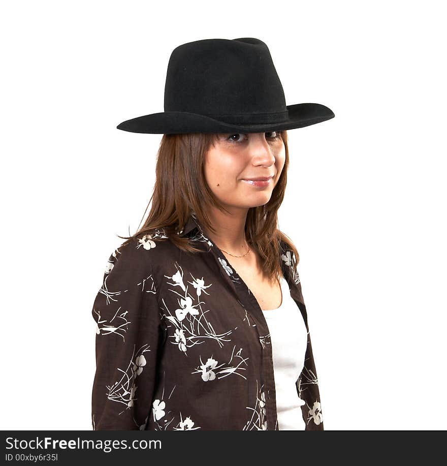 The girl in a brown jacket and a cowboy's hat. The girl in a brown jacket and a cowboy's hat