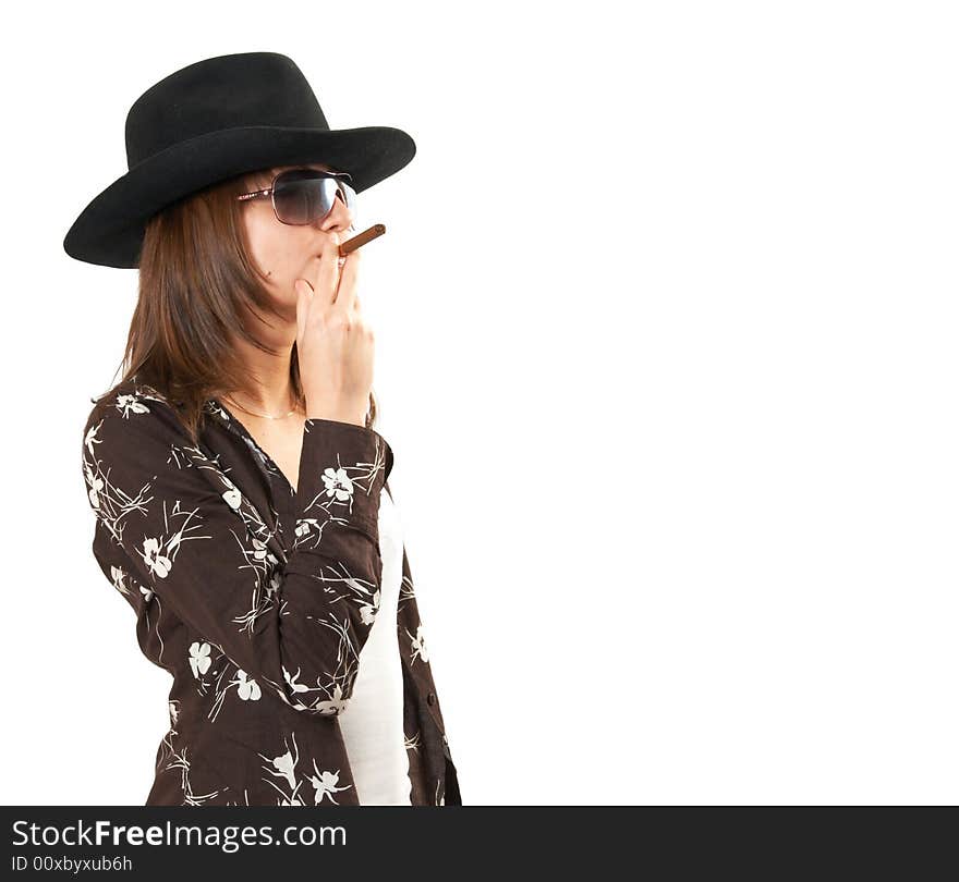 The girl in a brown jacket and a cowboy's hat. The girl in a brown jacket and a cowboy's hat