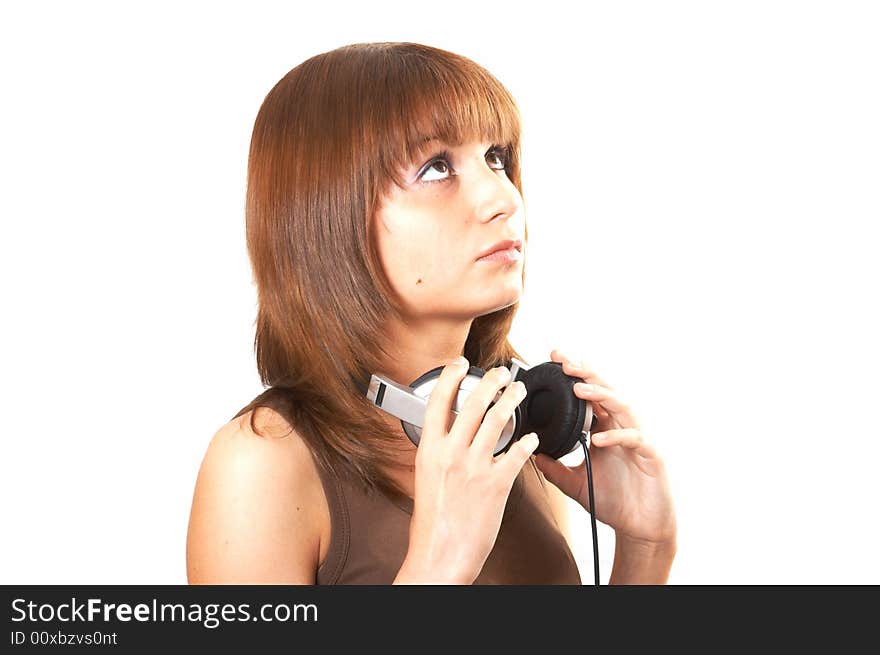 The girl in brown with headphones on a white background