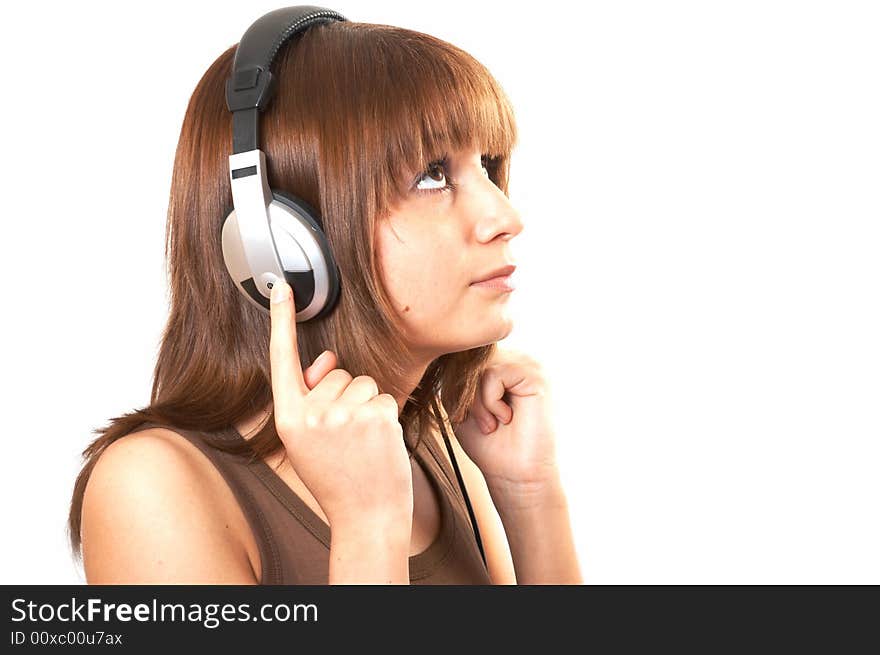 The girl in brown with headphones on a white background