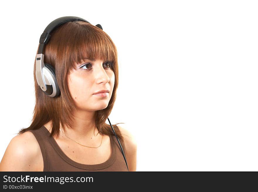 The girl in brown with headphones on a white background