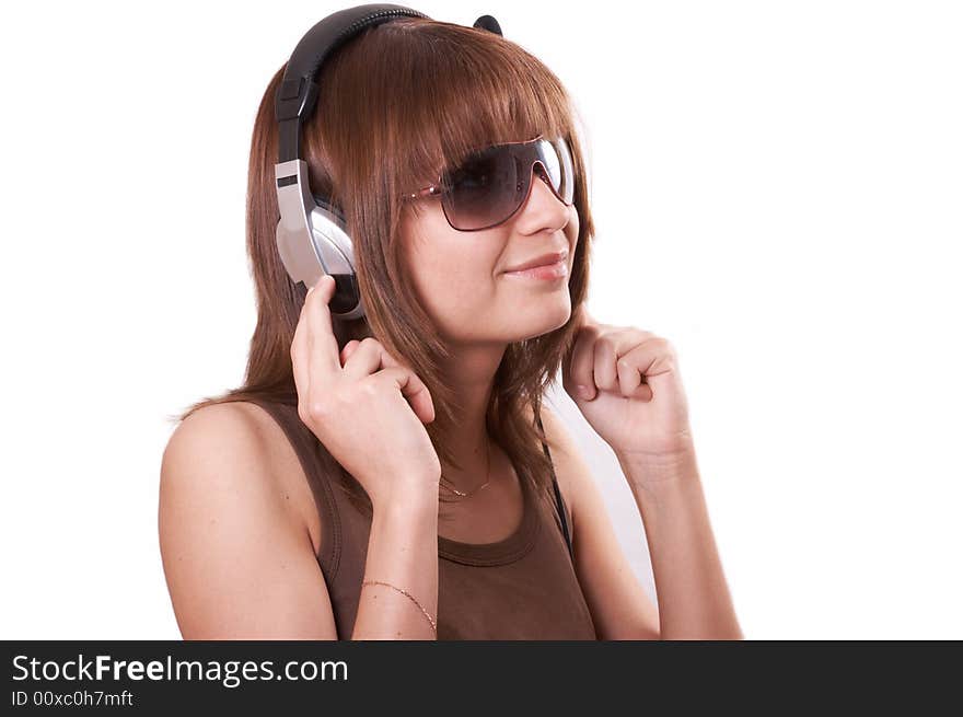 The girl in brown with headphones on a white background