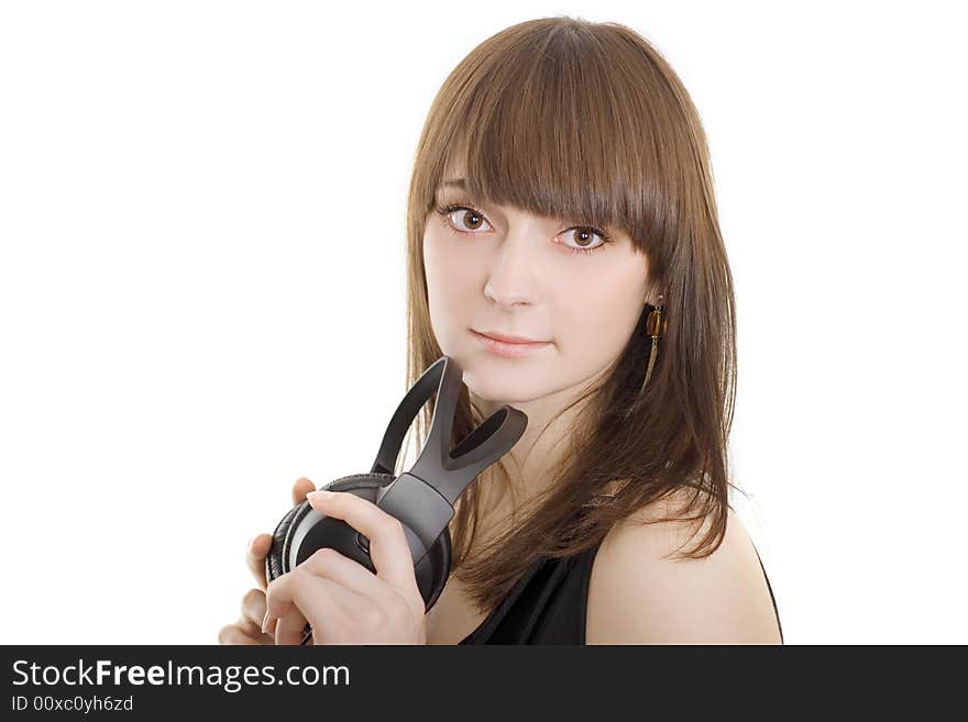 Portrait of a beautiful woman with earphones on white background. Portrait of a beautiful woman with earphones on white background