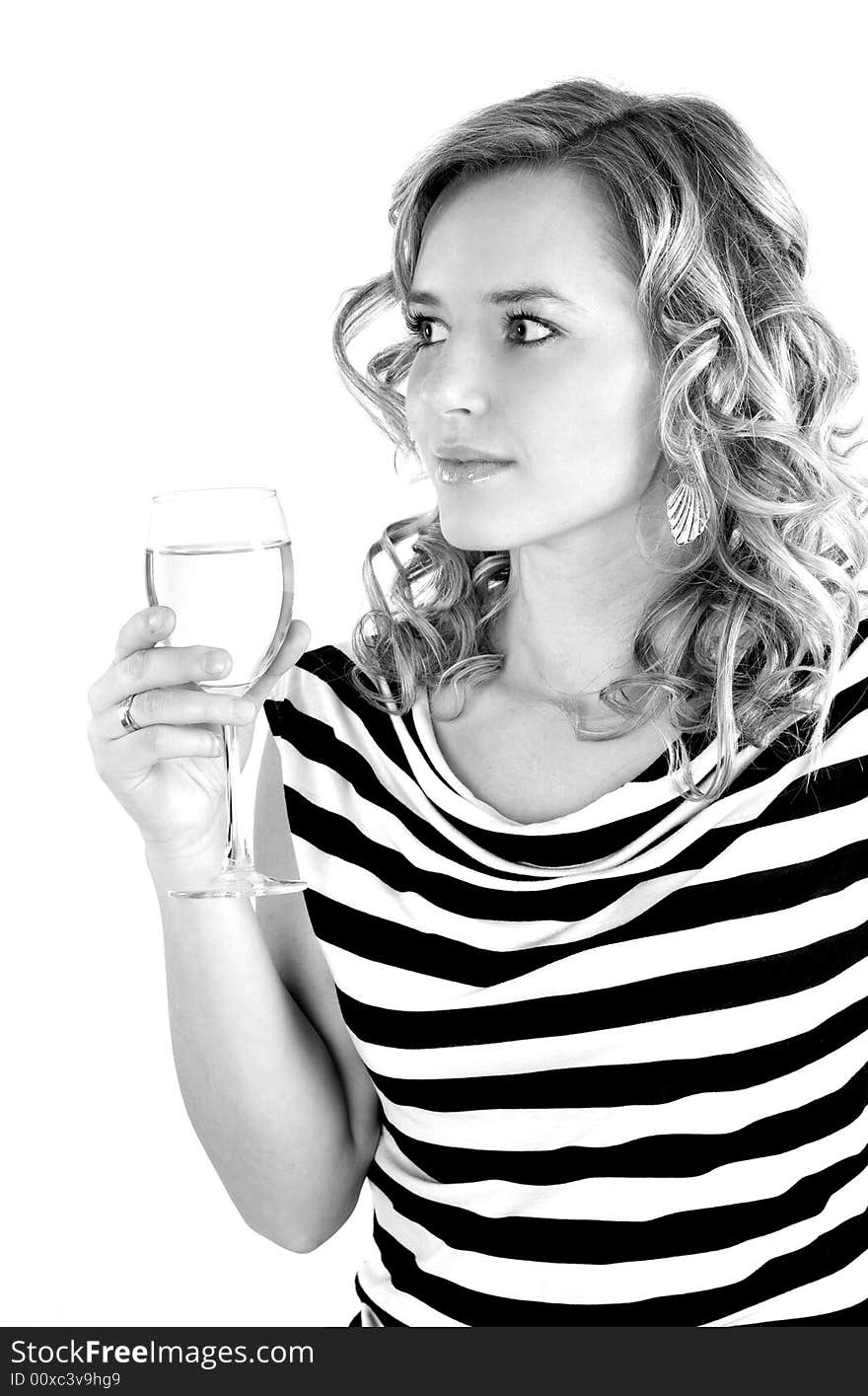 Beautiful young girl is drinking champagne. Beautiful young girl is drinking champagne