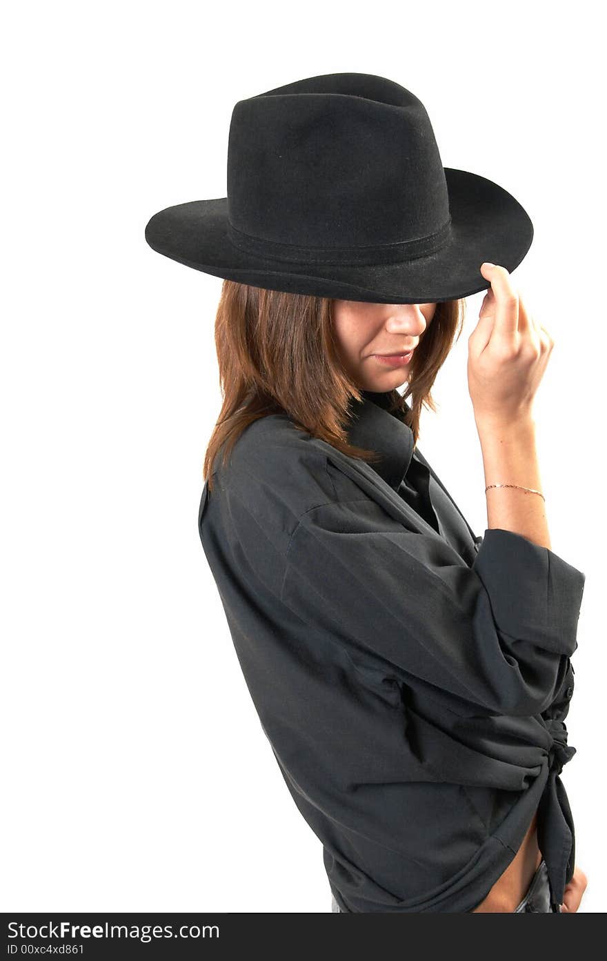 Girl In A Black Shirt And A Cowboy S Hat