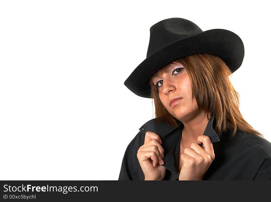 The girl in a black shirt and a cowboy's hat