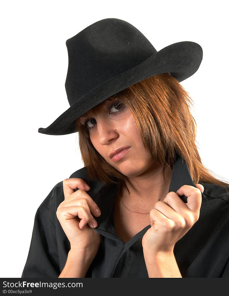 The girl in a black shirt and a cowboy's hat