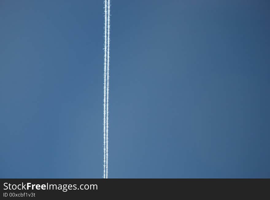 A contrail or vapour trail high in the Californian sky